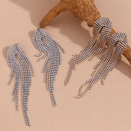 Λαμπερά μακριά σκουλαρίκια με λευκά zircon