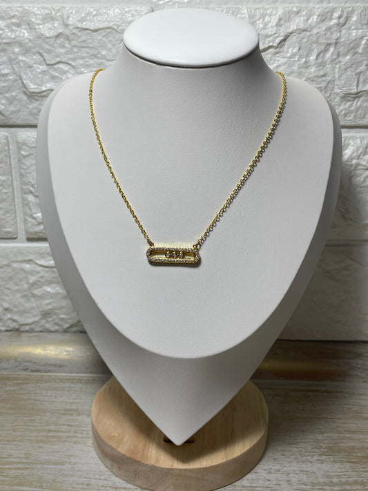 Χρυσό κολιέ με μπάρα zircon