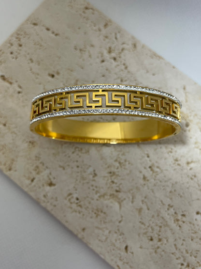 Χρυσή χειροπέδα με σχέδια