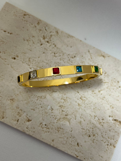 Χρυσή χειροπέδα με πολύχρωμα zircon