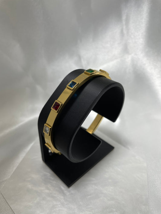 Χρυσή χειροπέδα με πολύχρωμα zircon