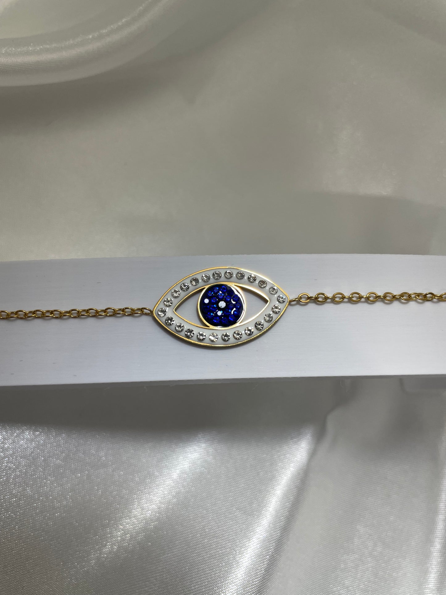 Χρυσό βραχιόλι με μπλε μάτι