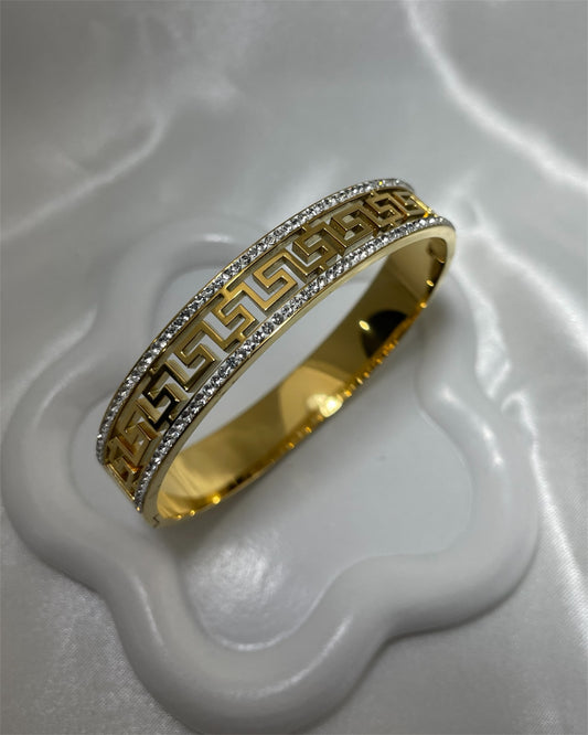 Χρυσή χειροπέδα με σχέδια